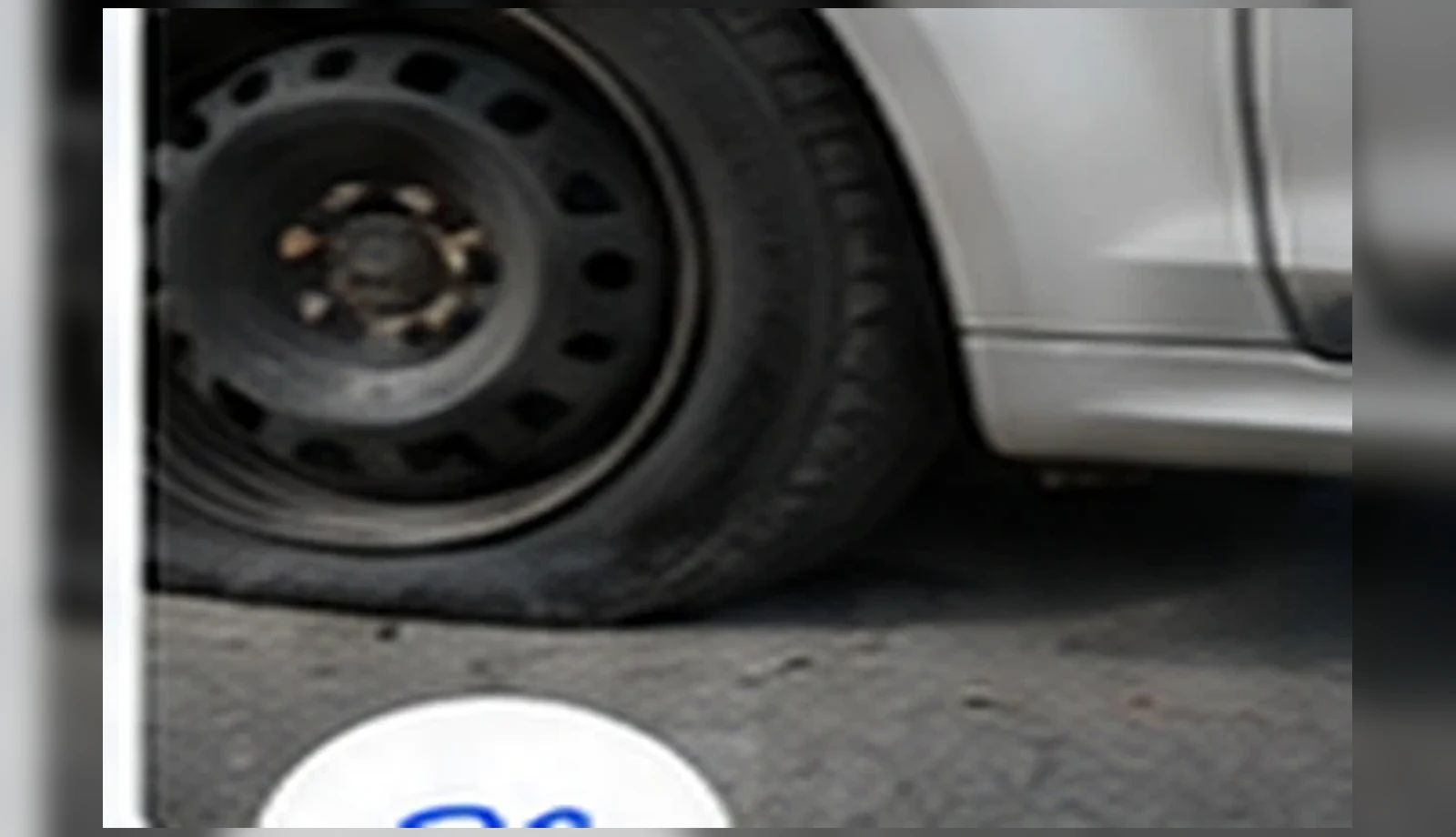 Malik Towing visual for flat tire assistance in Maryland