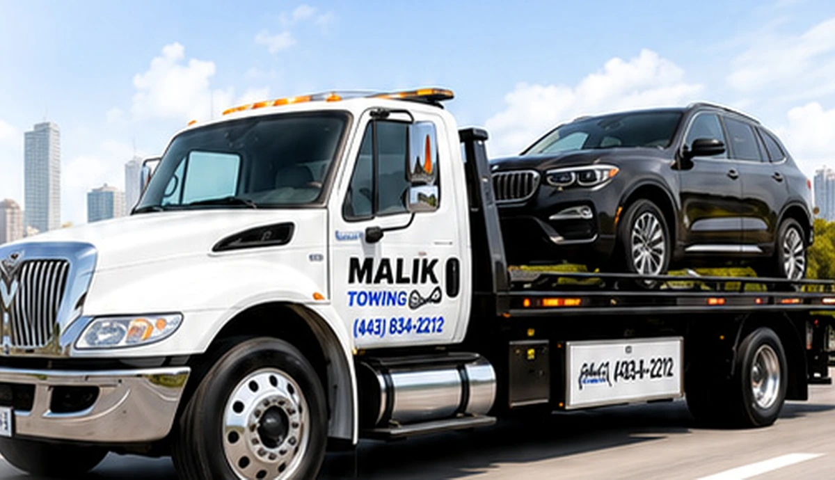 Premium Malik Towing truck visual with company name and phone number